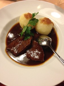 Traditional Bavarian beef dish with potato dumplings
